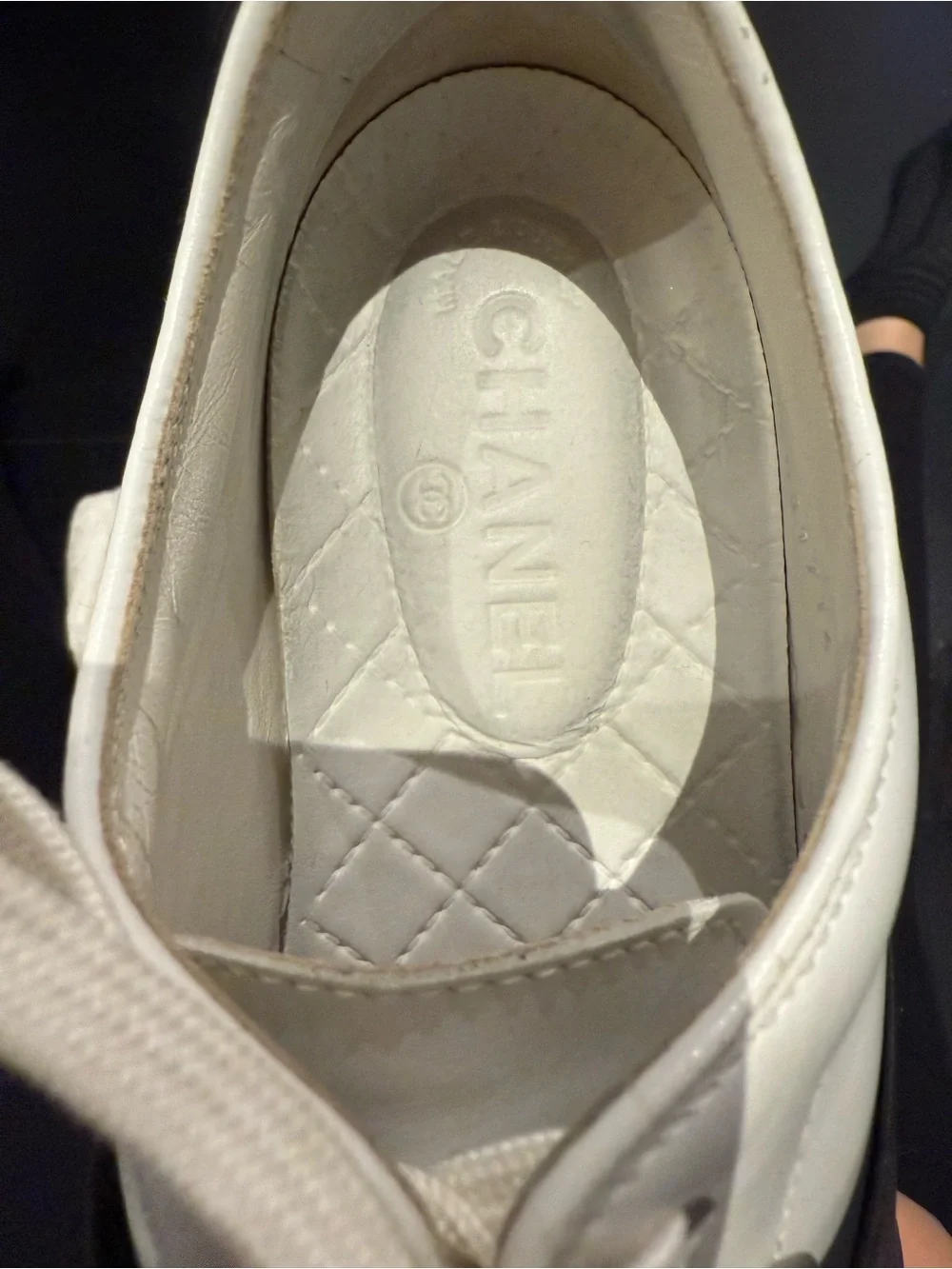 CHANEL Black and White Leather Slip-On Sneakers with laces